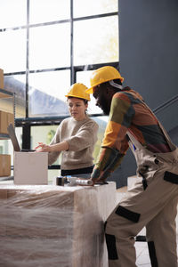 Rear view of man working at home