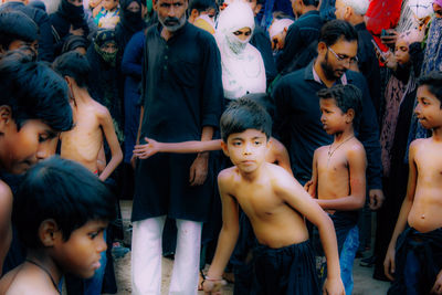 High angle view of people looking at camera