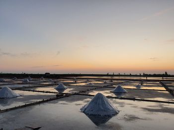 Scenic view of landscape against sky during sunset