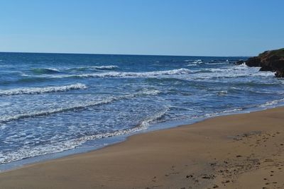 Scenic view of sea against clear sky