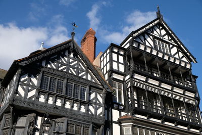 Low angle view of mock tudor buildings in chester, uk.