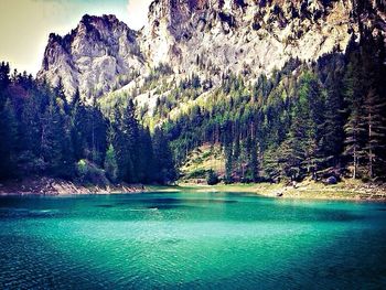 Scenic view of lake with mountains in background