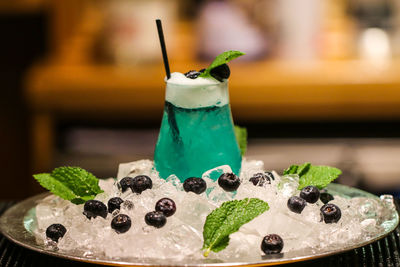 Close-up of fruit in glass on table