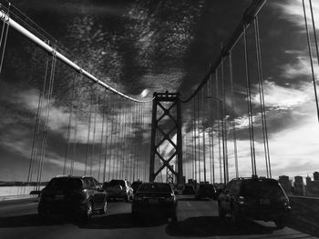 Cars on road against sky