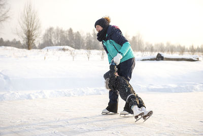 Full length of person in snow field