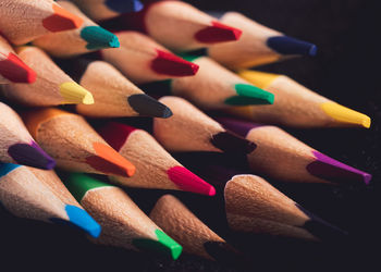 High angle view of colored pencils on table