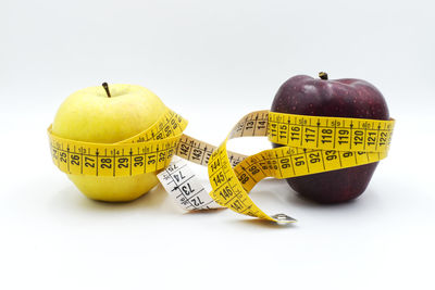 Close-up of apple against white background