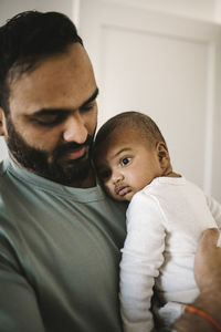 Father holding baby