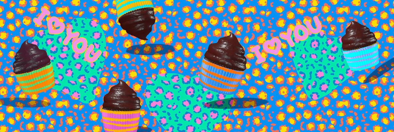 HIGH ANGLE VIEW OF MULTI COLORED WATER IN GLASS