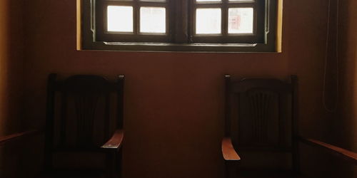 Empty chairs and table at home