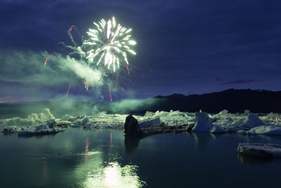 Firework display at night