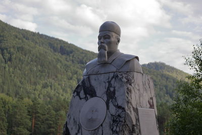 Low angle view of statue against mountain
