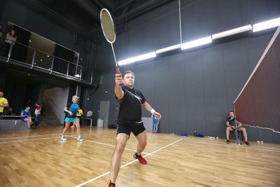 People playing basketball court