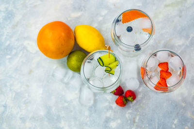 High angle view of fruits in glass jar on table