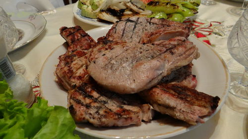 High angle view of meat in plate on table