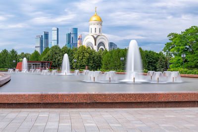 View of temple against building