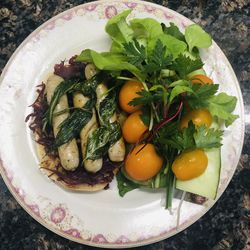 High angle view of fruits in plate on table