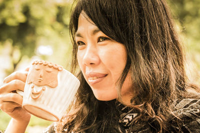 Close-up portrait of smiling woman