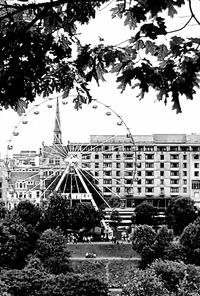 View of ferris wheel in city