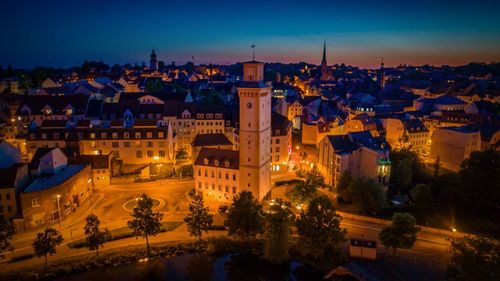 High angle view of illuminated buildings at night