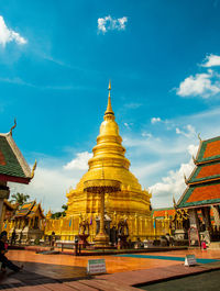 Temple outside building against sky