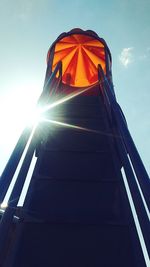 Low angle view of illuminated building against sky