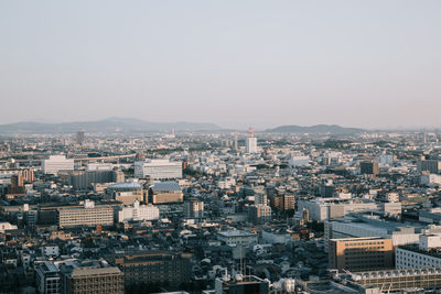 High angle view of buildings against clear sky