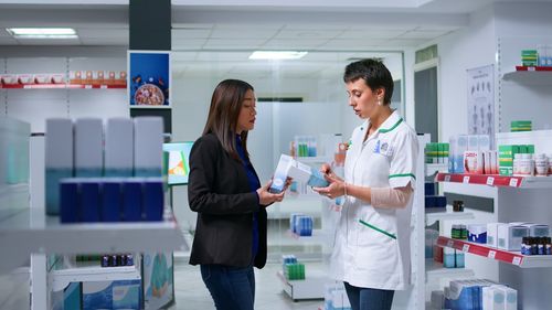 Portrait of female doctor standing in laboratory