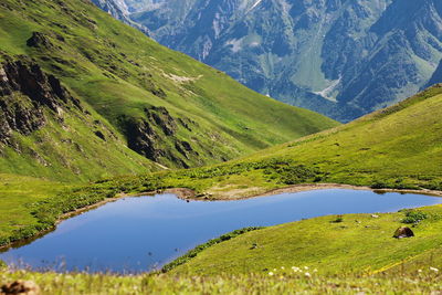 Scenic view of lake in valley