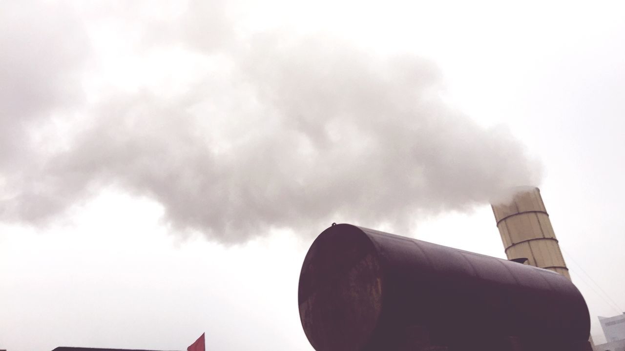 low angle view, sky, part of, transportation, cloud - sky, high section, mode of transport, roof, cement, cloud, day, man made object, outdoors, cloudy, air force, air pollution, development