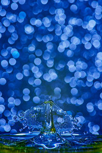 Defocused image of illuminated lights at night