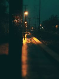 Illuminated street light at night