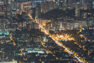 Aerial view of illuminated cityscape at night