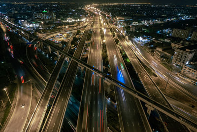 High angle view of light trails on road at night