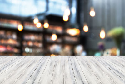 Close-up of illuminated table at night