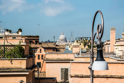 Panoramic view of buildings in city against sky