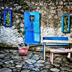 Open door on wall of old building