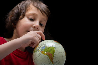 Happy preschooler boy discovering world as back to school concep