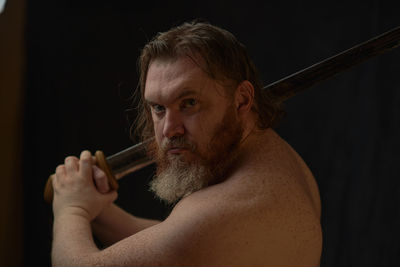 Close-up of man smoking cigarette