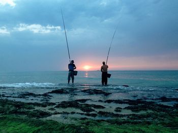 Scenic view of sea at sunset