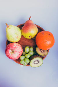 Close-up of fruits on white background