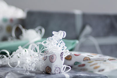 Close up of gift box with ribbons