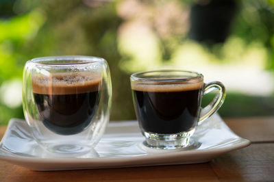 Close-up of coffee cup on table