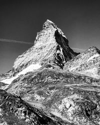 Scenic view of snowcapped mountain against sky