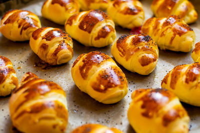 Buns with fillings of delight arranged on a tray after baking