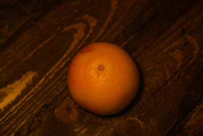 Close-up of orange fruit on table