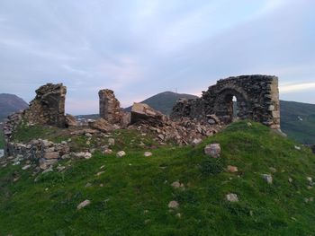 View of castle on mountain against sky