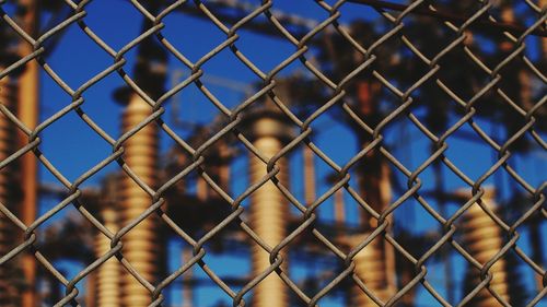 Chainlink fence seen through chainlink fence