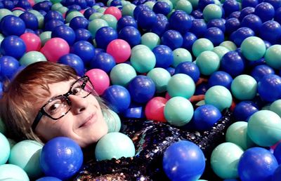 Portrait of smiling woman in ball pool