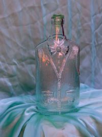 Glass bottle in sunset